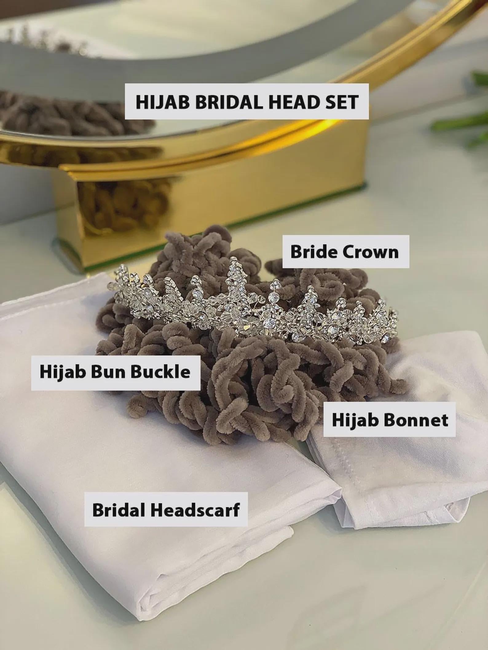 Silver rhinestone bridal crown on gray velvet bun with PART5 veil