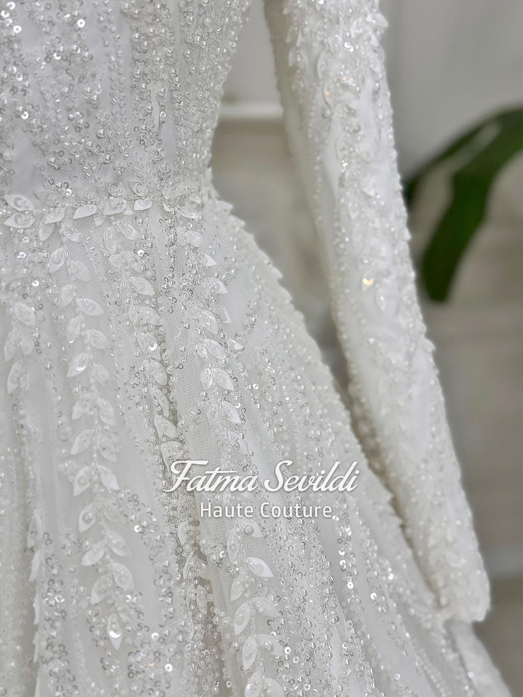 White veiled beaded lace hijab wedding dress with high neck and long sleeves