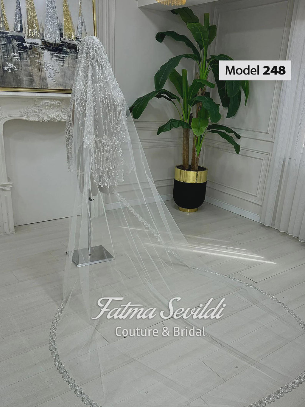 Delicate lace edge cathedral bridal veil with hand-sewn silver beading