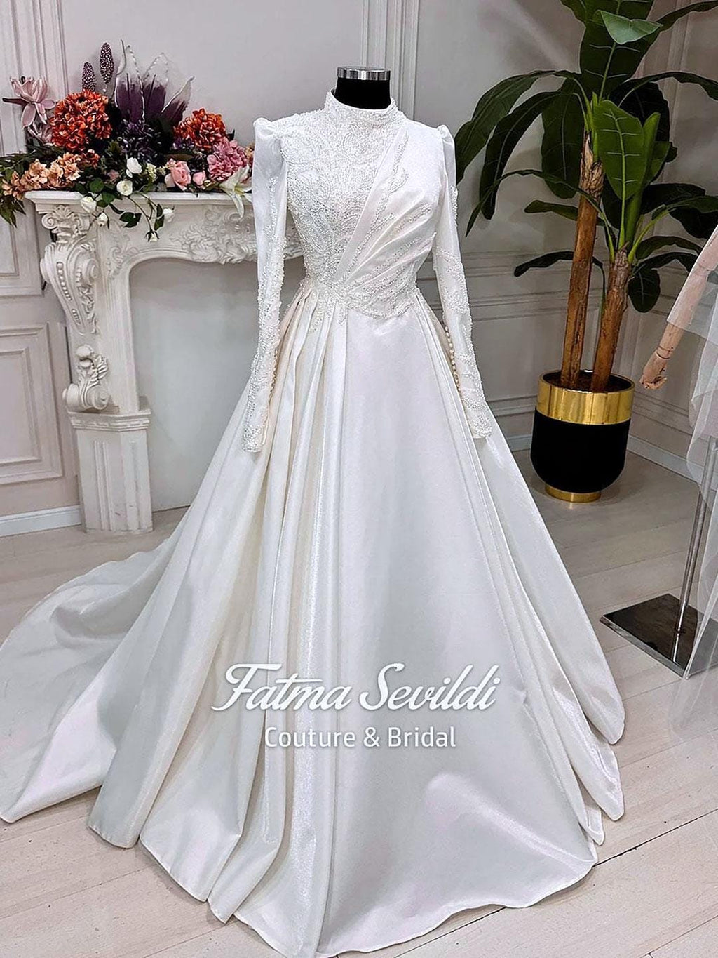Elegant white satin veiled hijab wedding gown with beaded lace, high neck, long sleeves