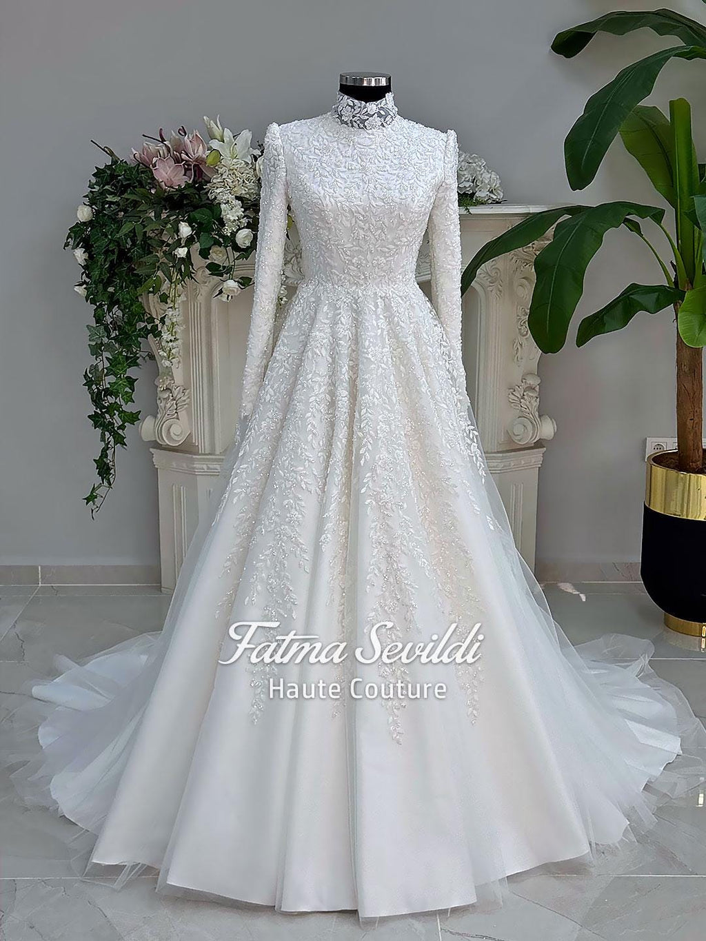 Elegant veiled hijab lace A-line wedding gown with long sleeves and high neck