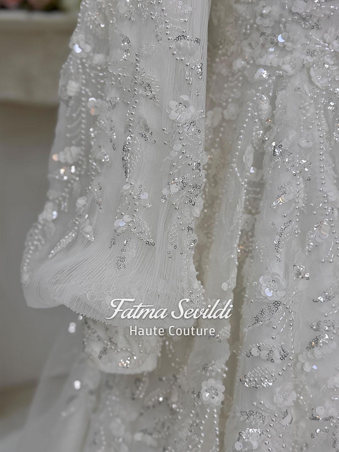 Elegant veiled hijab wedding dress with beaded lace and sequins