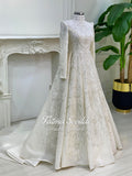 Luxury hijab wedding dress with high neck, long sleeves, and hand-beaded lace on an A-line modest bridal gown, custom made.