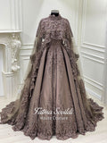 Luxury hijab wedding dress with long cloak, beaded lace detailing, and full-coverage modest ballgown silhouette. Custom made bridal gown with couture craftsmanship and elegant train.