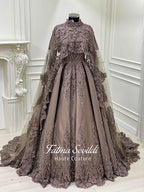 Luxury hijab wedding dress with long cloak, beaded lace detailing, and full-coverage modest ballgown silhouette. Custom made bridal gown with couture craftsmanship and elegant train.