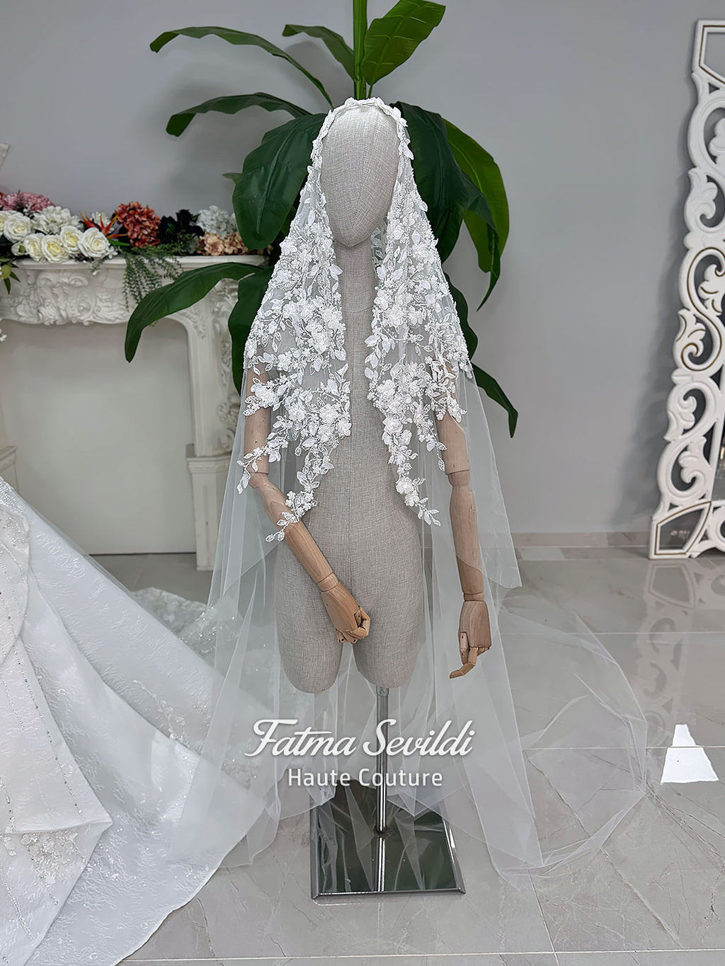 3-in-1 white hijab wedding dress with a beaded mermaid gown, detachable overskirt and long sleeve high-neck bridal topper. Convertible modest bridal set with dimensional floral lace and a coordinating lace veil.