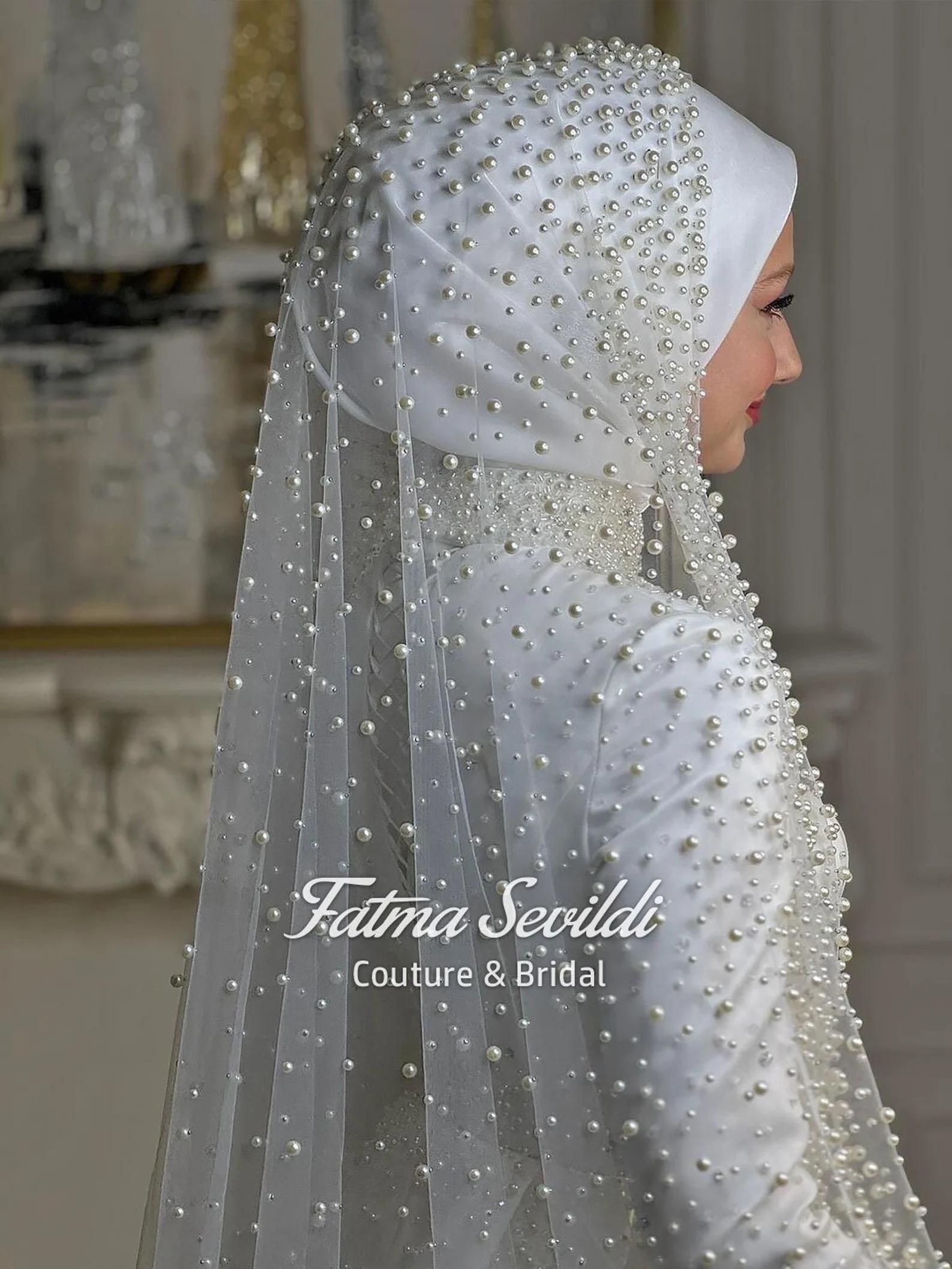 White bridal hijab with silver beads, sheer veil, pearl lace cathedral style
