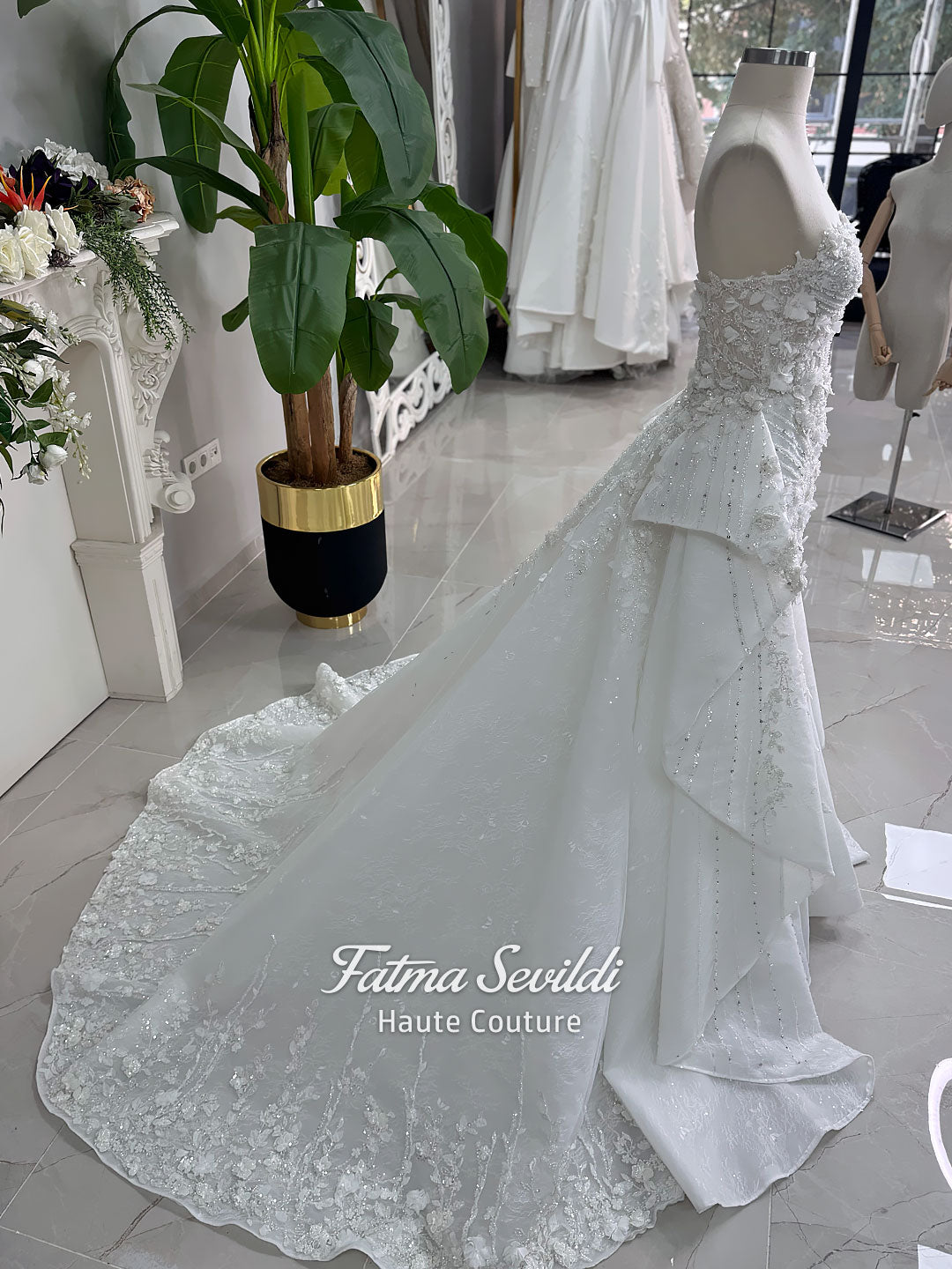 3-in-1 white hijab wedding dress with a beaded mermaid gown, detachable overskirt and long sleeve high-neck bridal topper. Convertible modest bridal set with dimensional floral lace and a coordinating lace veil.