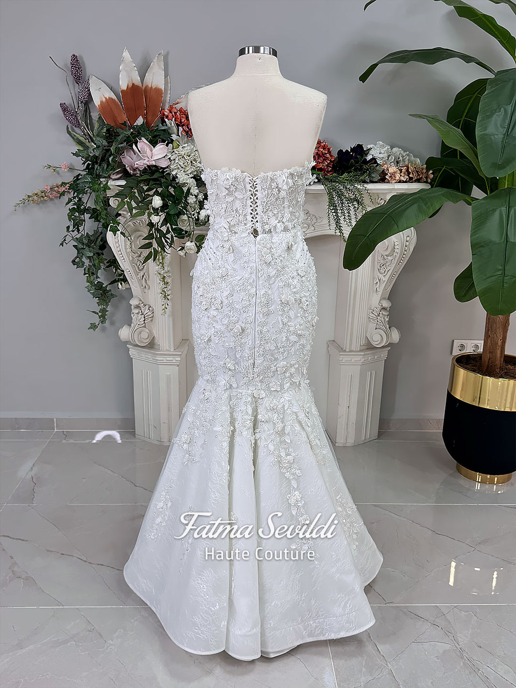 3-in-1 white hijab wedding dress with a beaded mermaid gown, detachable overskirt and long sleeve high-neck bridal topper. Convertible modest bridal set with dimensional floral lace and a coordinating lace veil.