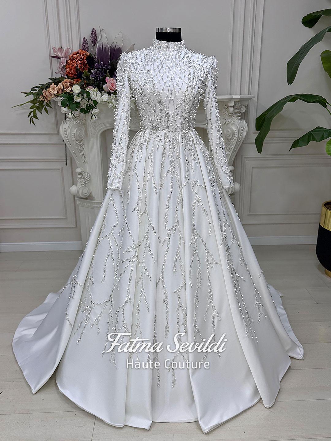 Veiled Pearl high-neck beaded lace long-sleeve A-line wedding gown