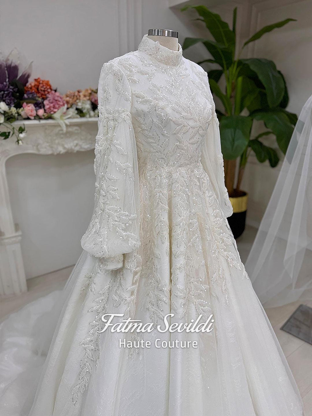 Elegant high-neck veiled hijab wedding gown with long sleeve beaded lace