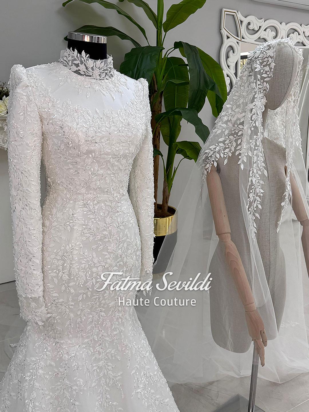 Elegant veiled mermaid hijab wedding dress with high neck, long sleeves, beaded lace