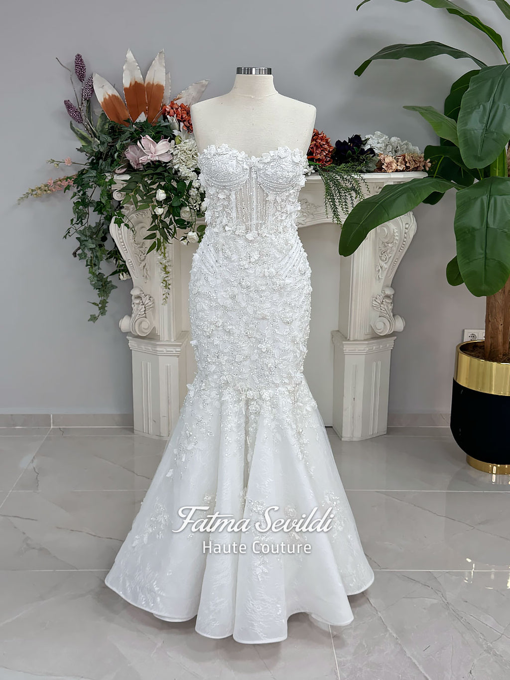 3-in-1 white hijab wedding dress with a beaded mermaid gown, detachable overskirt and long sleeve high-neck bridal topper. Convertible modest bridal set with dimensional floral lace and a coordinating lace veil.