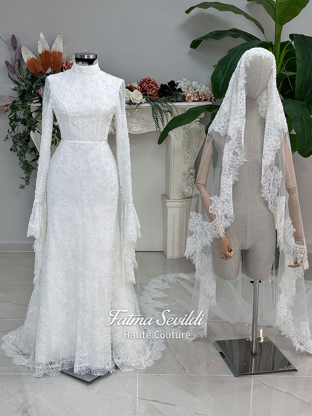 Luxury hijab wedding dress with long flounce sleeves, a high mock neckline, beaded floral lace, corset fit, mermaid silhouette, detachable overskirt, and included lace veil. Modest Muslim bridal gown shown from front, back, and detail views.