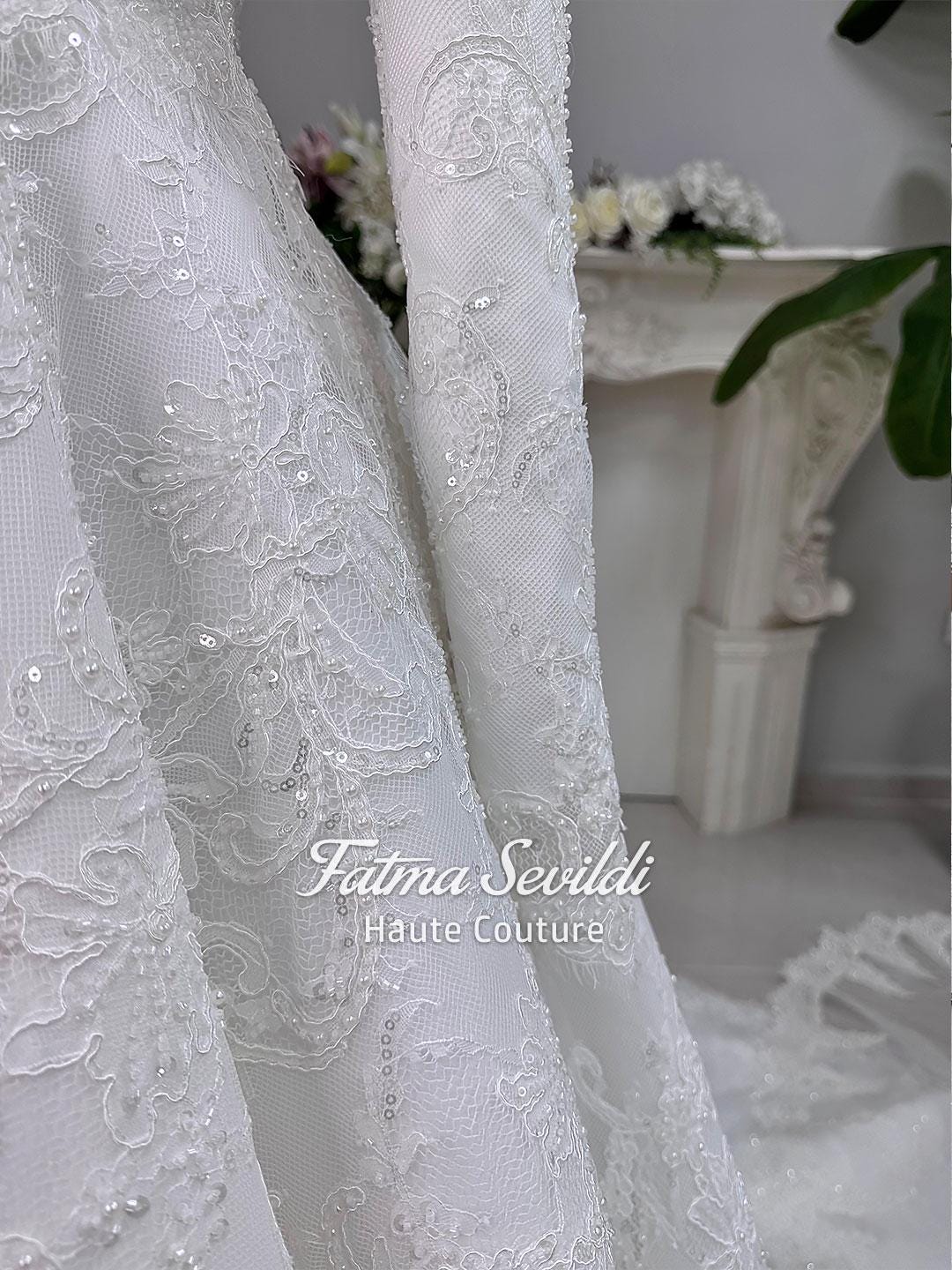 Elegant veiled hijab wedding dress with beaded lace embroidery
