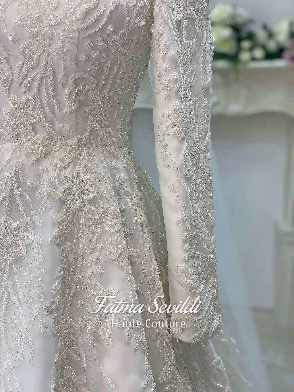 Luxury veiled hijab wedding dress with beaded lace, long sleeves, full coverage bodice, and elegant A-line bridal silhouette. Modest Muslim wedding gown with custom couture detailing and romantic lace veil.