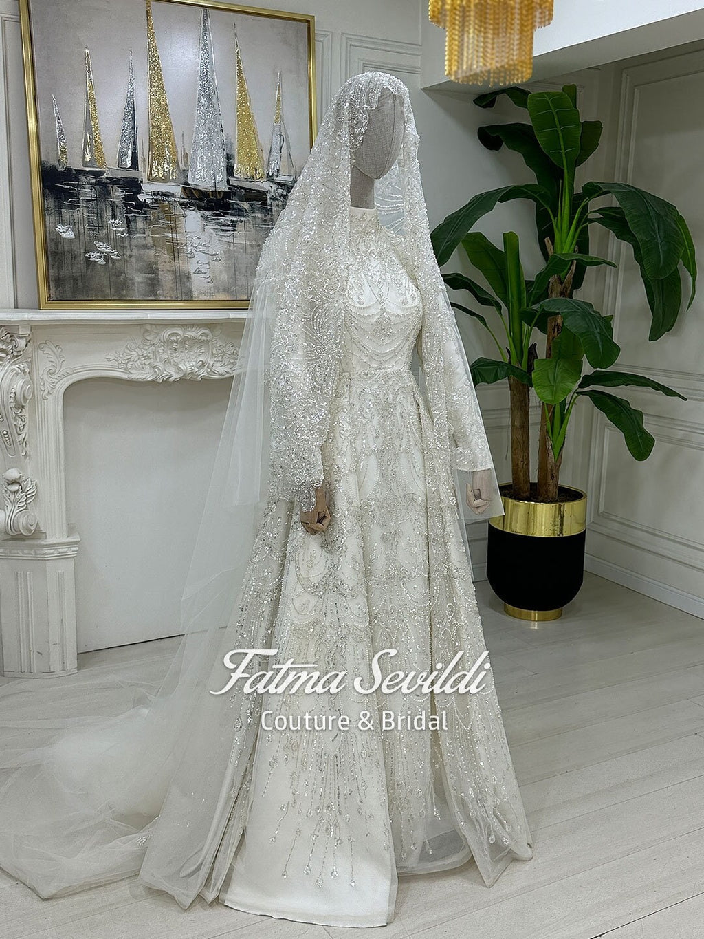 Elegant veiled hijab wedding dress with silver beading and lace sleeves