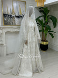 Elegant veiled hijab wedding dress with silver beading and lace sleeves