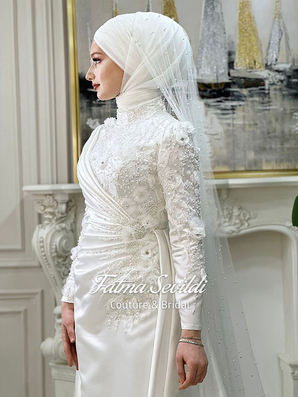 Elegant beaded lace long-sleeve modest Muslim bridal gown with veil
