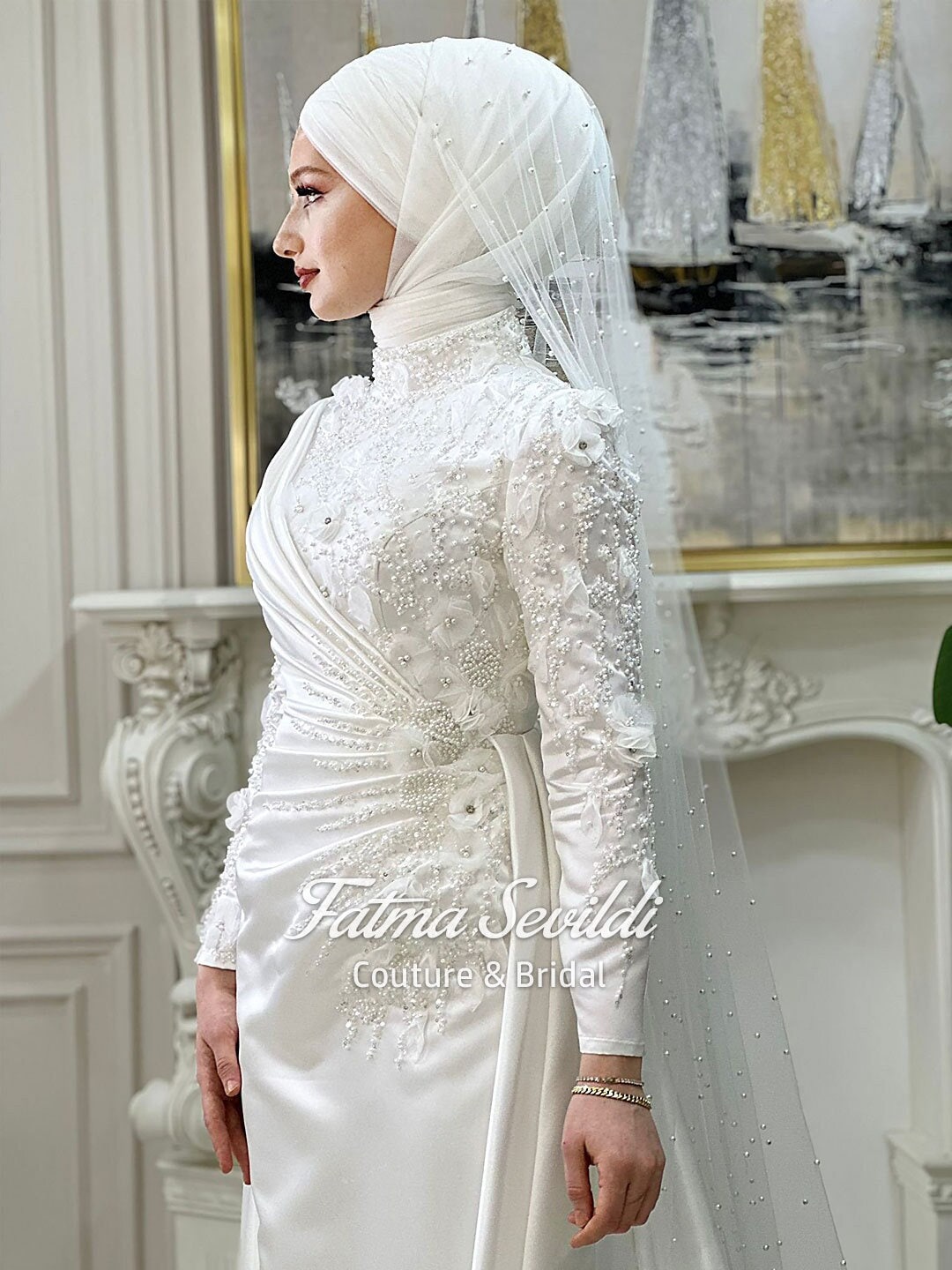 Elegant beaded lace long-sleeve modest Muslim bridal gown with veil