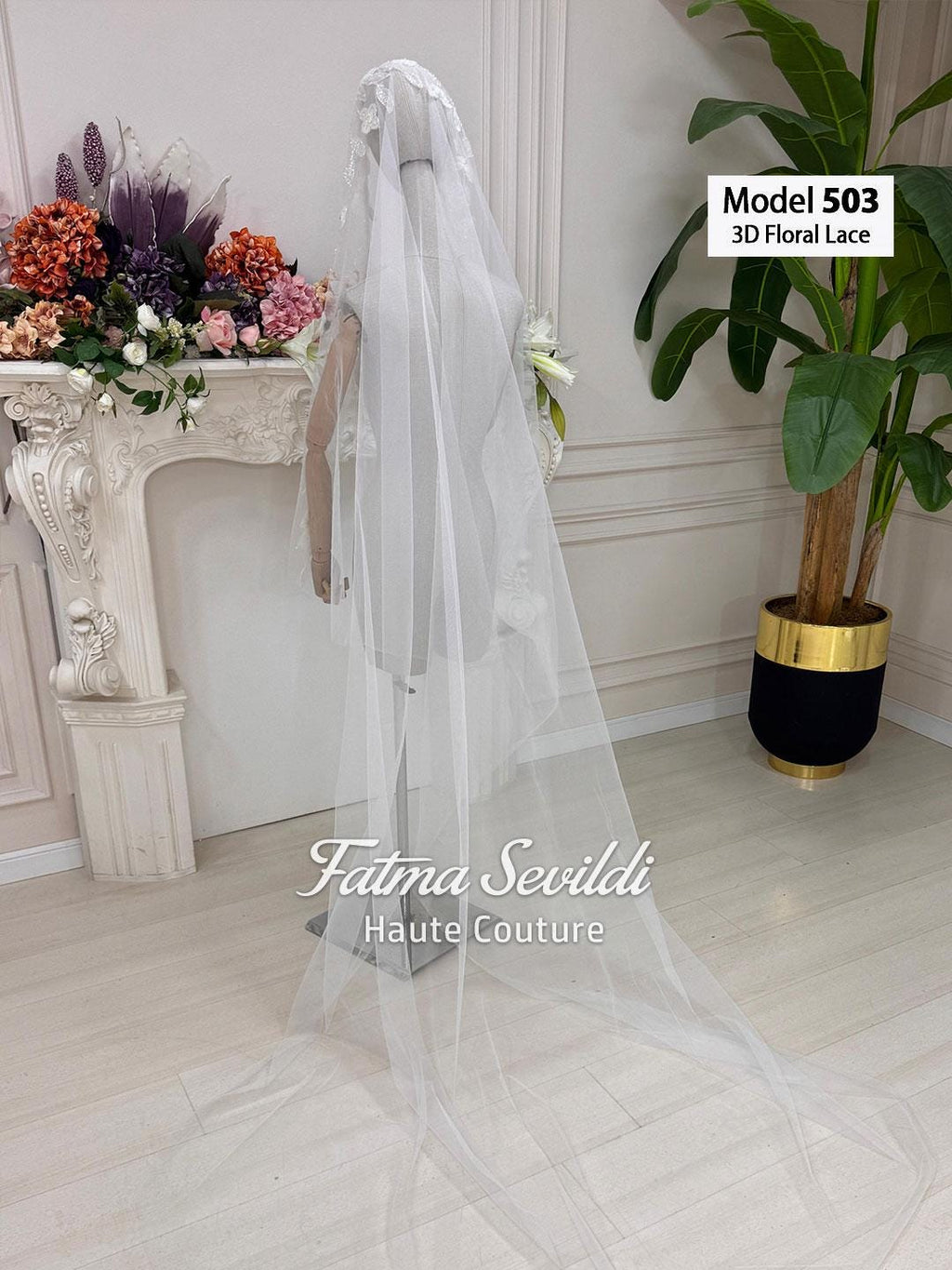 Delicate white 3D floral lace cathedral veil with beaded hand-sewn appliqué