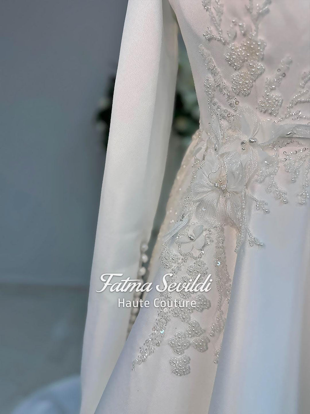 Elegant high-neck hijab wedding dress in white satin with beaded lace