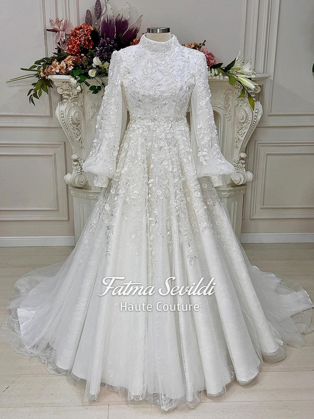 Veiled hijab wedding dress with balloon sleeves and high neck beaded lace