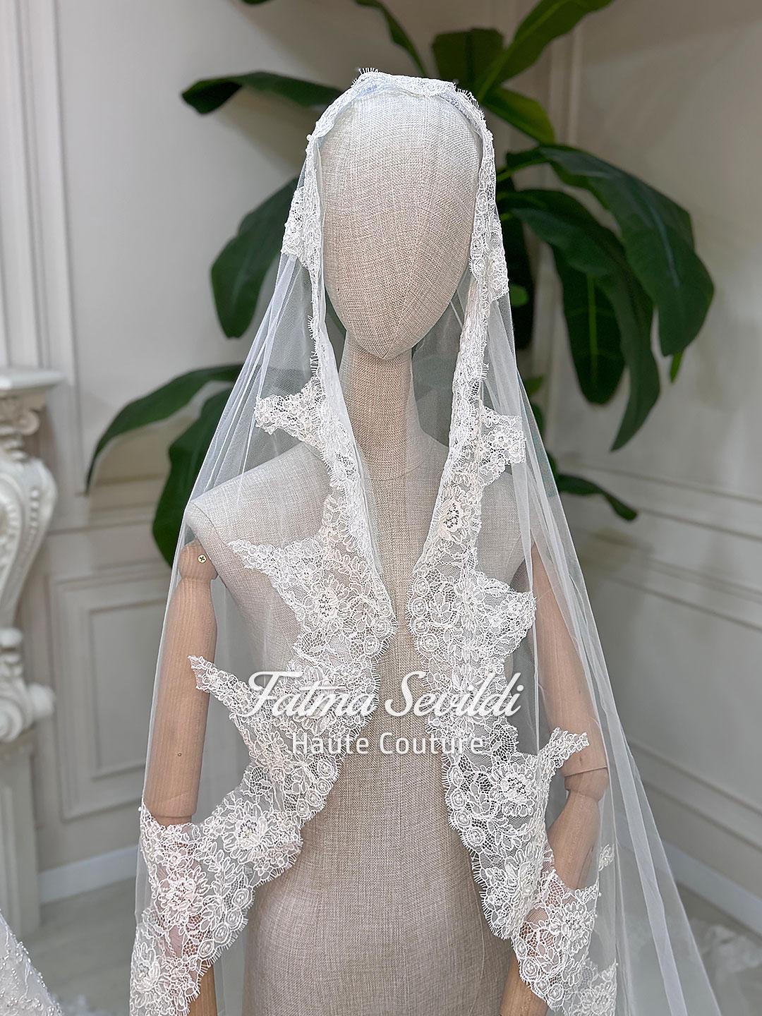 White lace bridal veil with floral embroidery on Veiled A-Line gown
