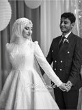 Luxury hijab wedding dress with high neck and long sleeves, featuring elegant beaded lace over a satin A-line silhouette for a modest bridal look.