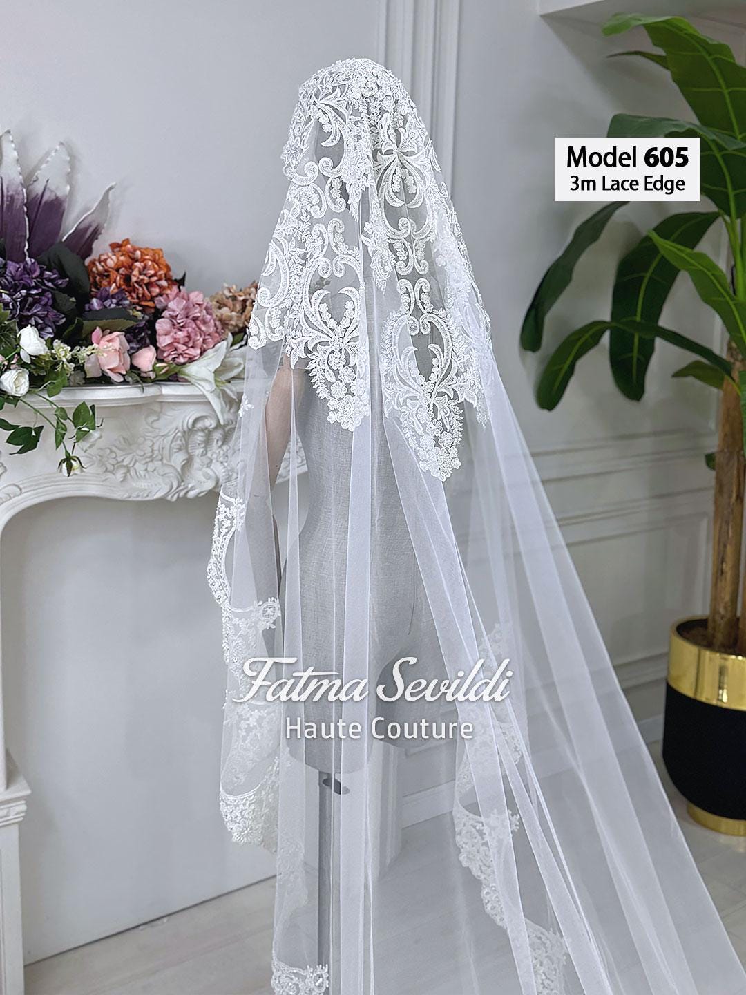 Elegant white lace cathedral hijab veil with floral embroidery and 3m tulle train by Fatma Sevildi