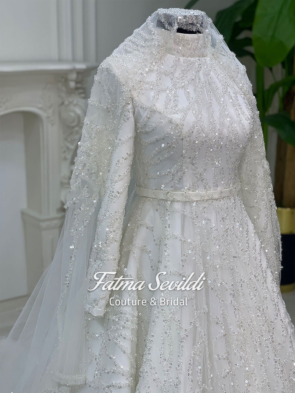 Elegant veiled Muslim wedding dress with sparkling white beaded lace gown and sheer veil