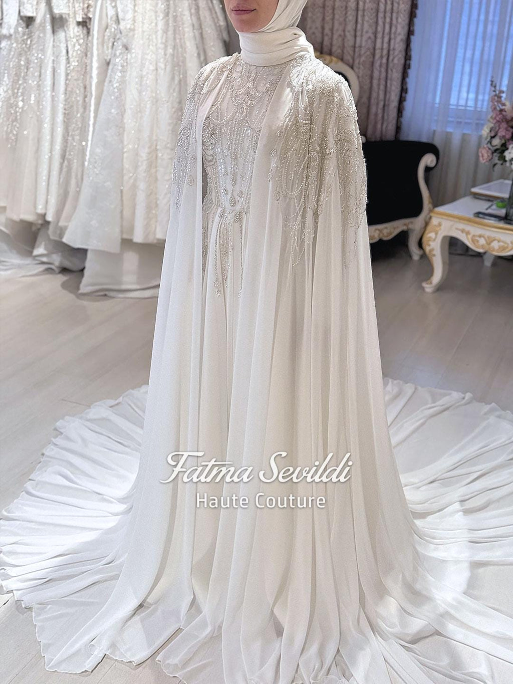 Satin Muslim wedding dress with long sheer cape, silver beading