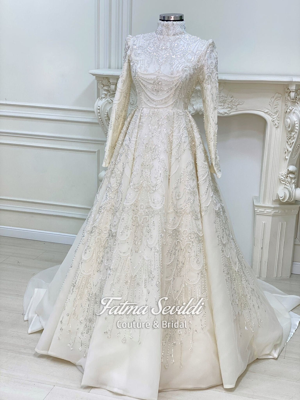 Elegant ivory Muslim wedding gown with beaded lace high neck long sleeves