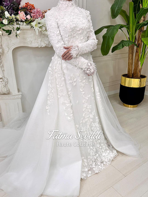 Elegant white mermaid hijab wedding dress with high neck, long sleeves, and 3D floral lace