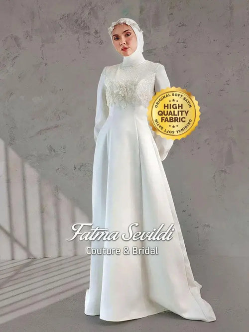 3D beaded lace modest wedding dress by Fatma Sevildi, long sleeve high neck satin A-line gown