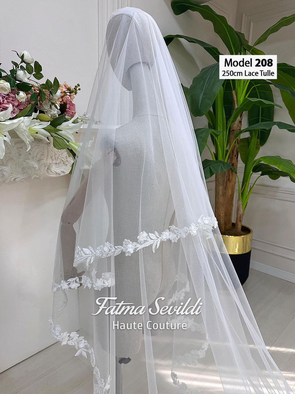 Delicate white lace tulle bridal veil model 208 with floral embroidery edges