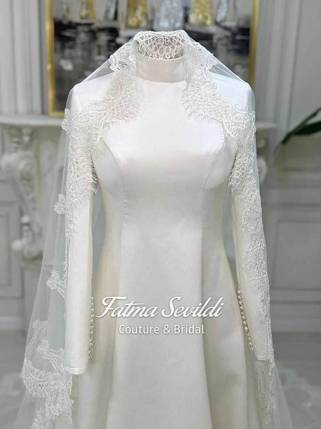 Elegant high neck satin A-line bridal gown with long lace sleeves and veiled hijab