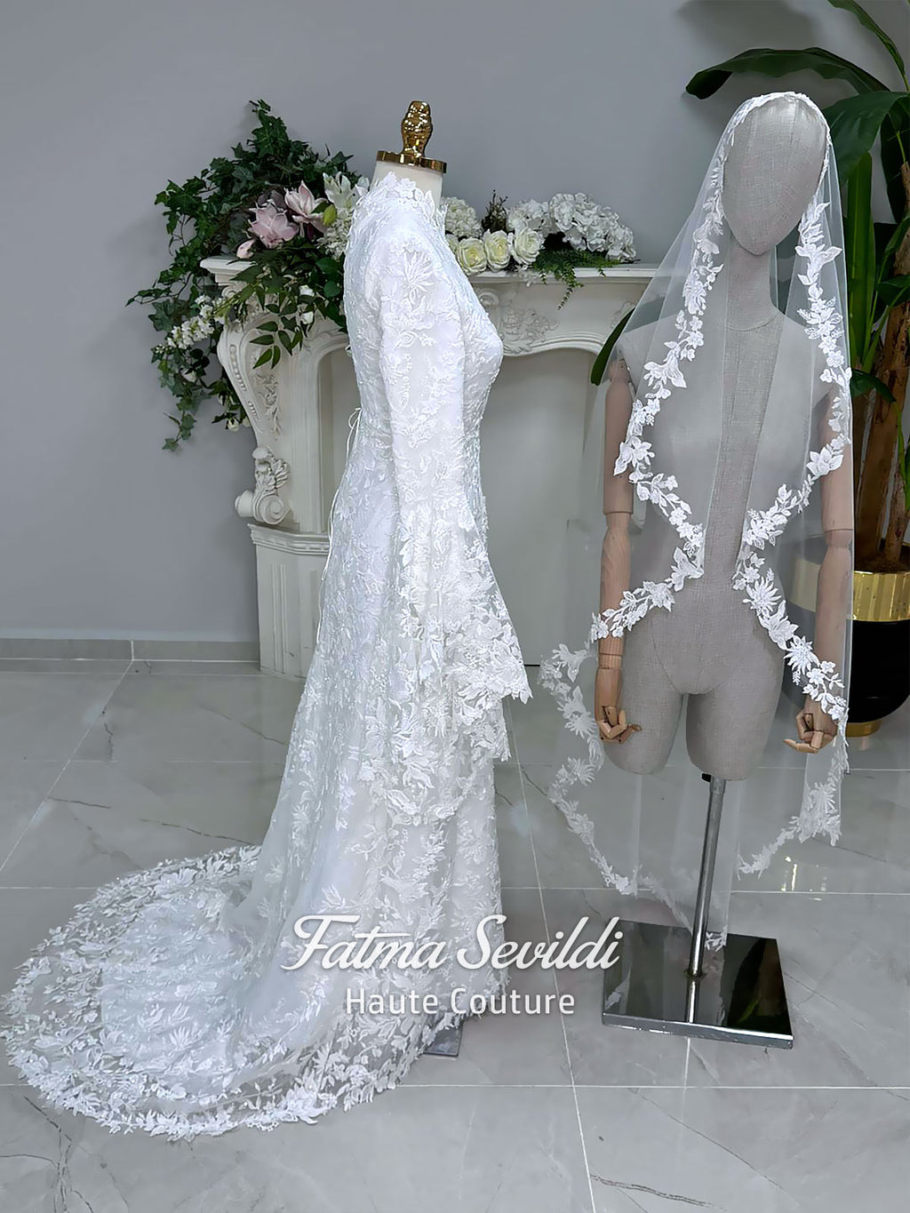Veiled hijab wedding dress with high neck, long sleeves, and beaded floral lace in an elegant A-line couture silhouette.