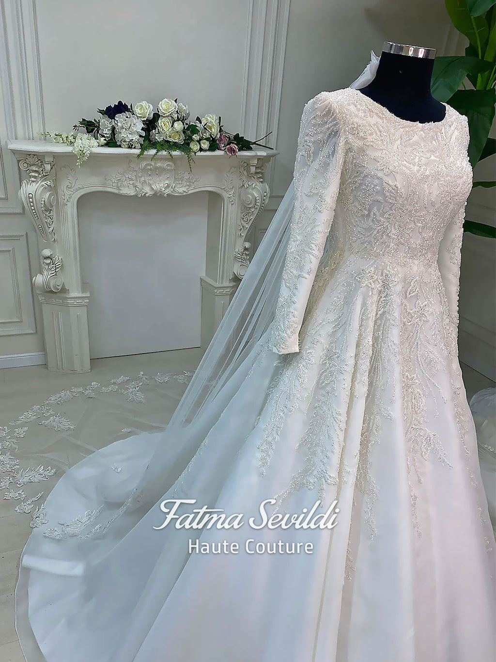 Luxury veiled hijab wedding dress with beaded lace, long sleeves, full coverage bodice, and elegant A-line bridal silhouette. Modest Muslim wedding gown with custom couture detailing and romantic lace veil.
