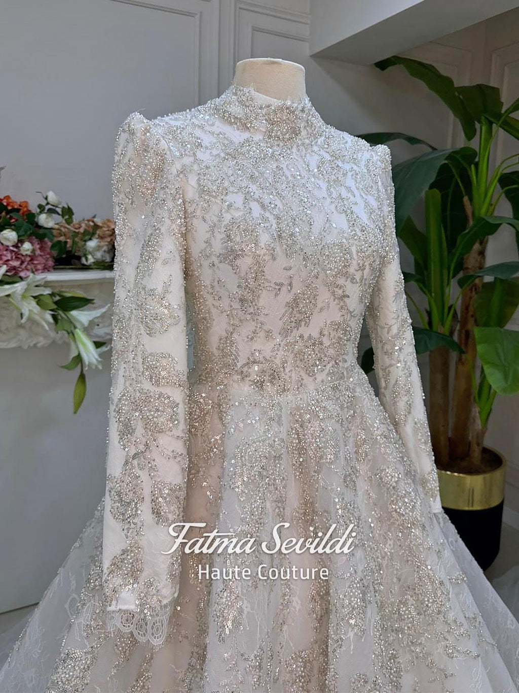 Luxurious ivory Fatma Sevildi veiled modest wedding gown with beaded lace
