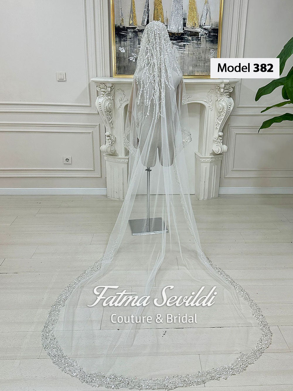 Hand-sewn beaded lace mantilla cathedral veil on mannequin