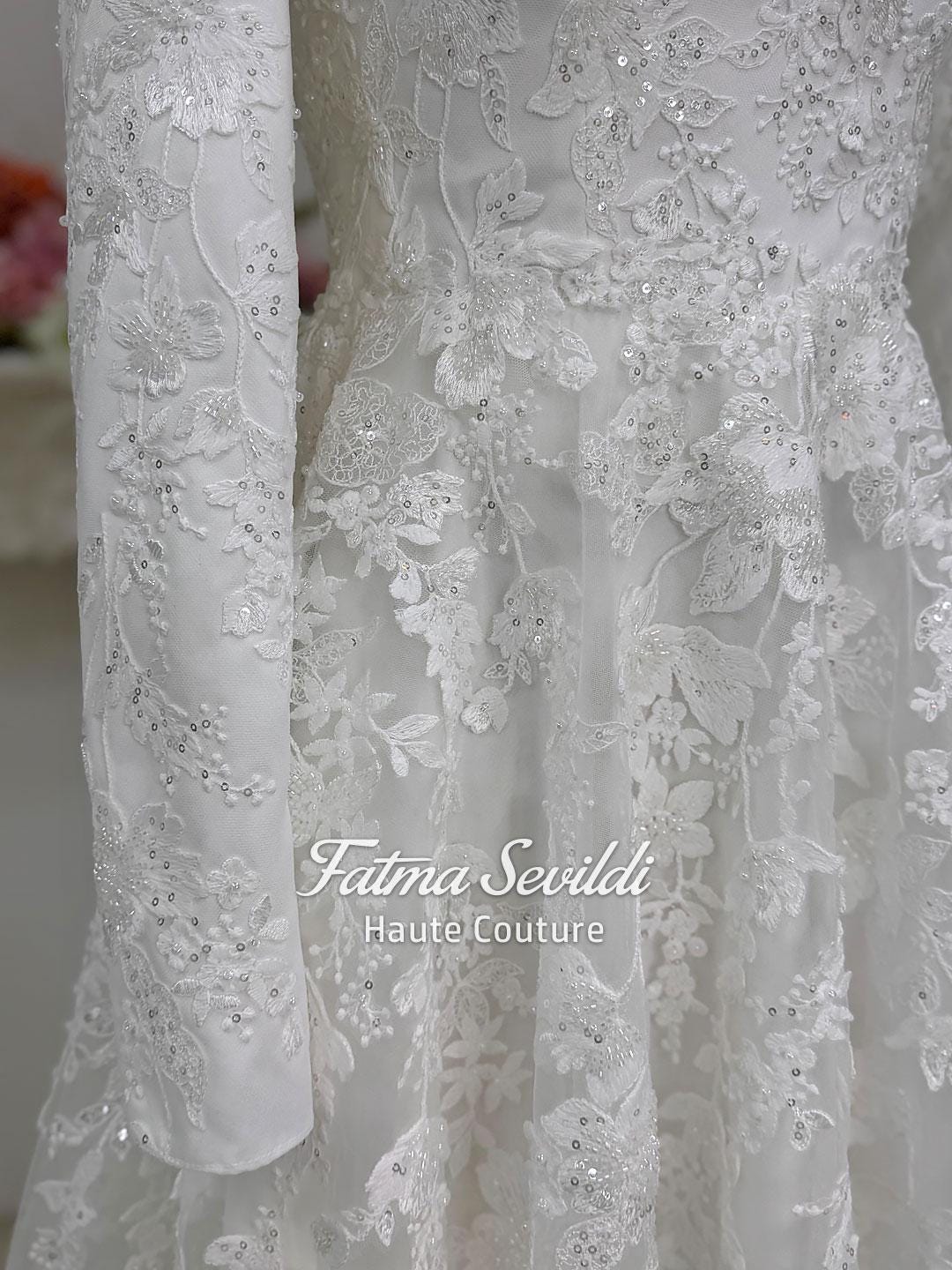 Veiled hijab beaded lace wedding gown with floral embroidery and sequins