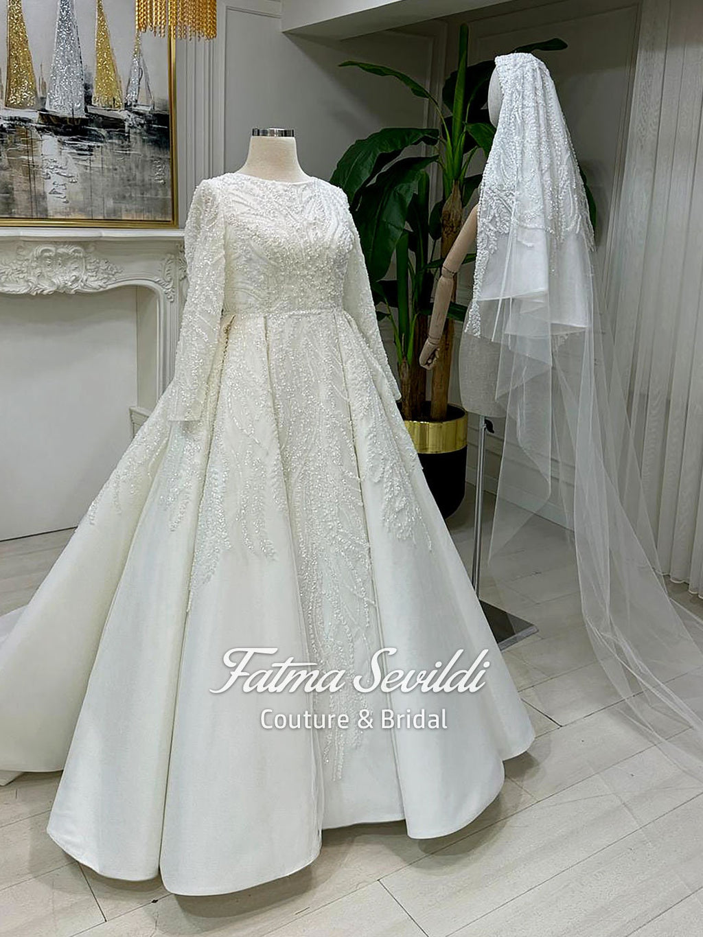 Elegant ivory beaded lace Muslim wedding dress with long sleeves and veil