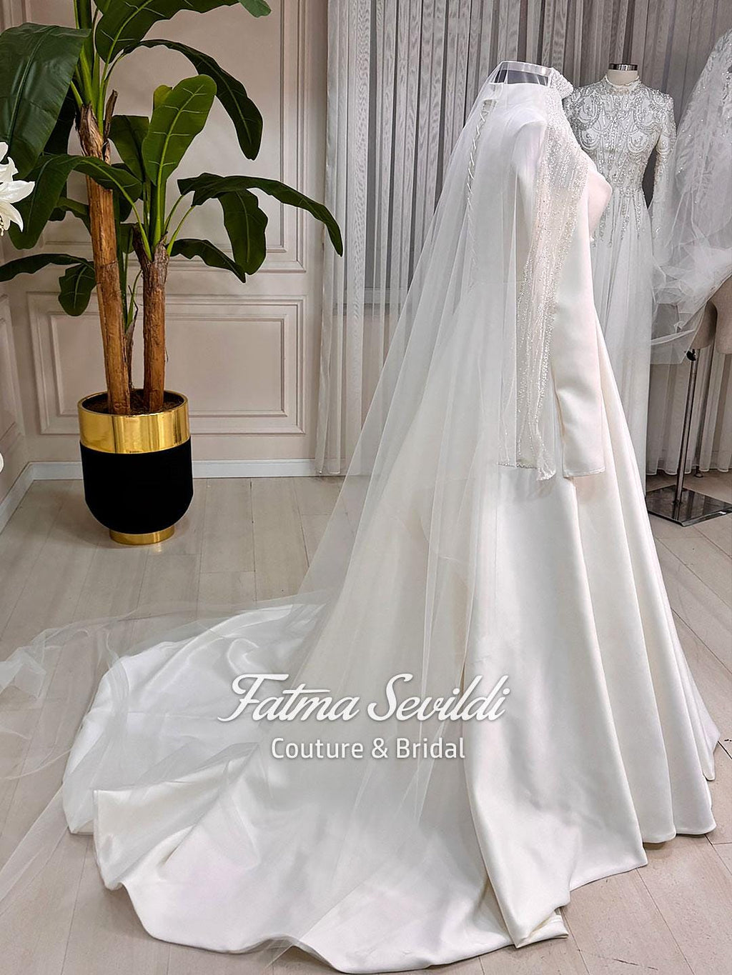 Elegant high-neck satin Muslim wedding gown with lace veil
