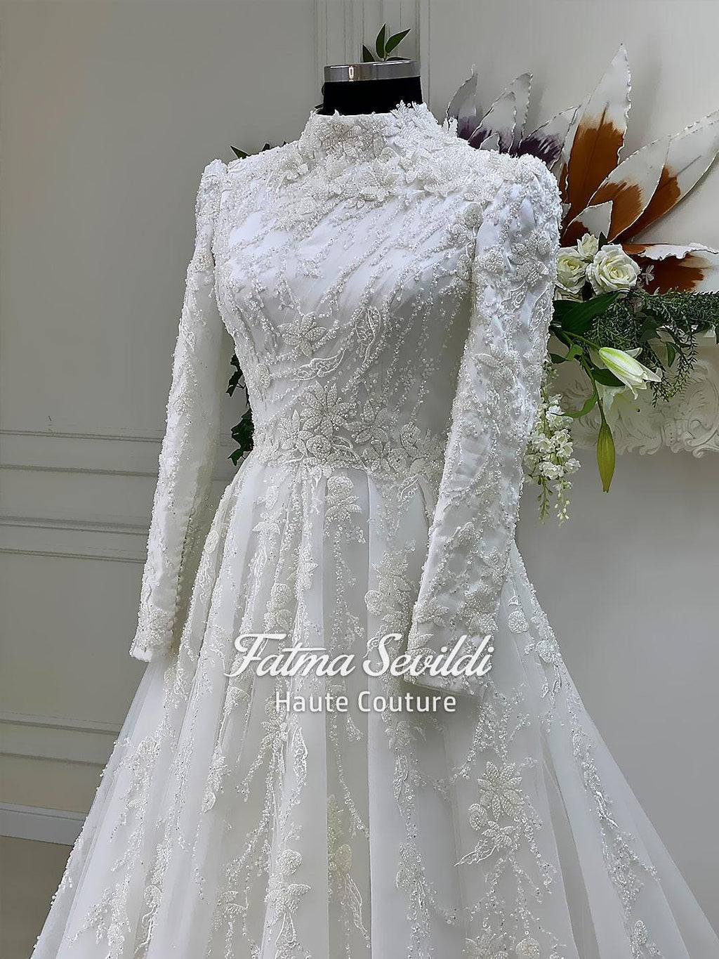 Elegant veiled Muslim wedding dress with high neck, beaded lace, long sleeves