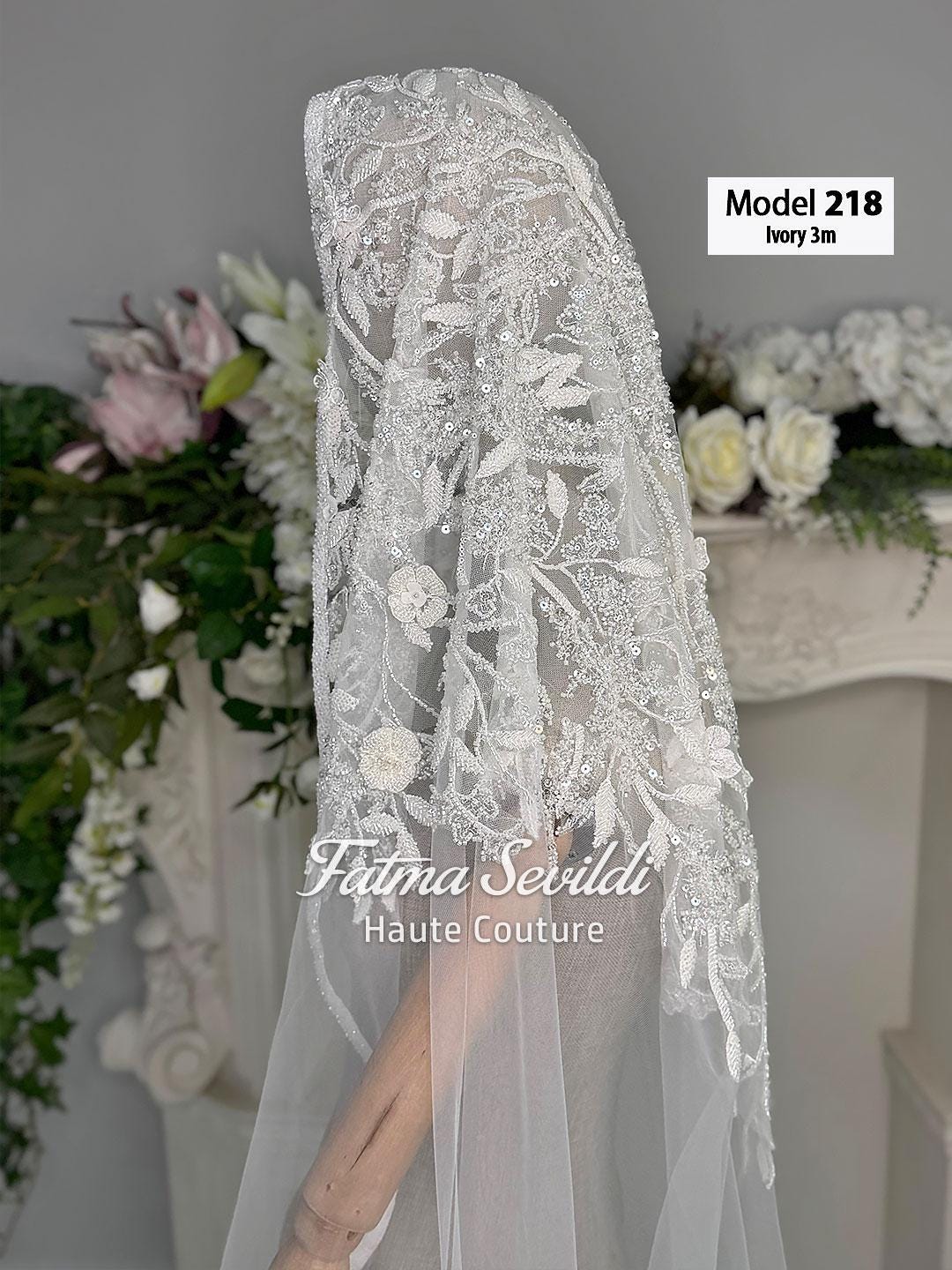Ivory lace cathedral veil with floral embroidery, beading, and hijab option