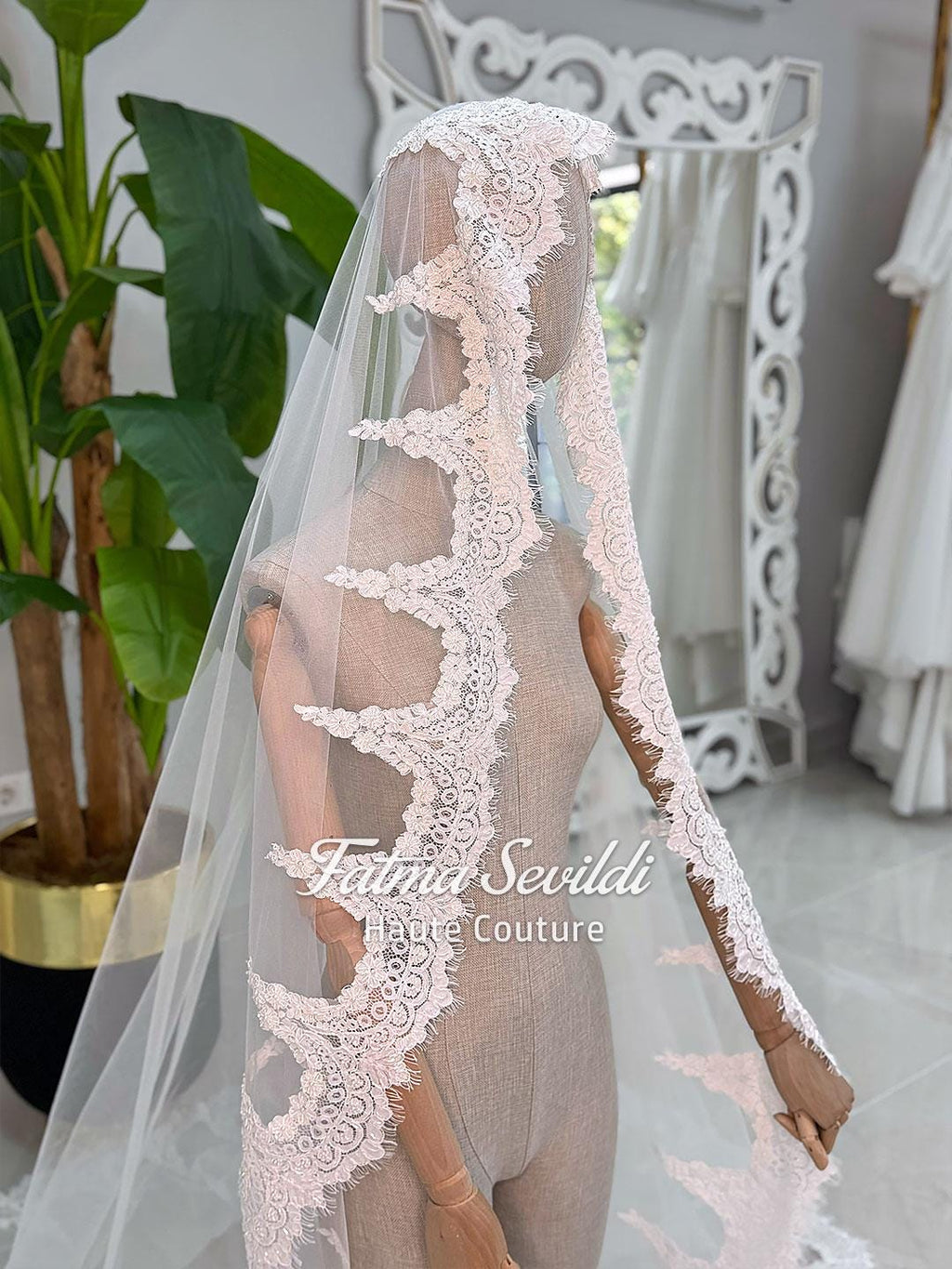 Delicate white lace veil with floral patterns for elegant hijab wedding dress