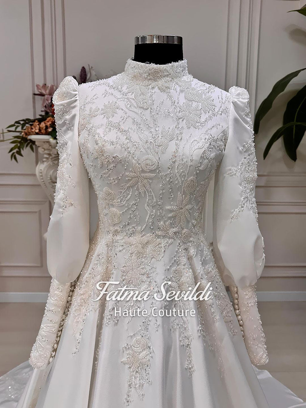 A-line Muslim wedding dress with beaded lace and long puffed sleeves