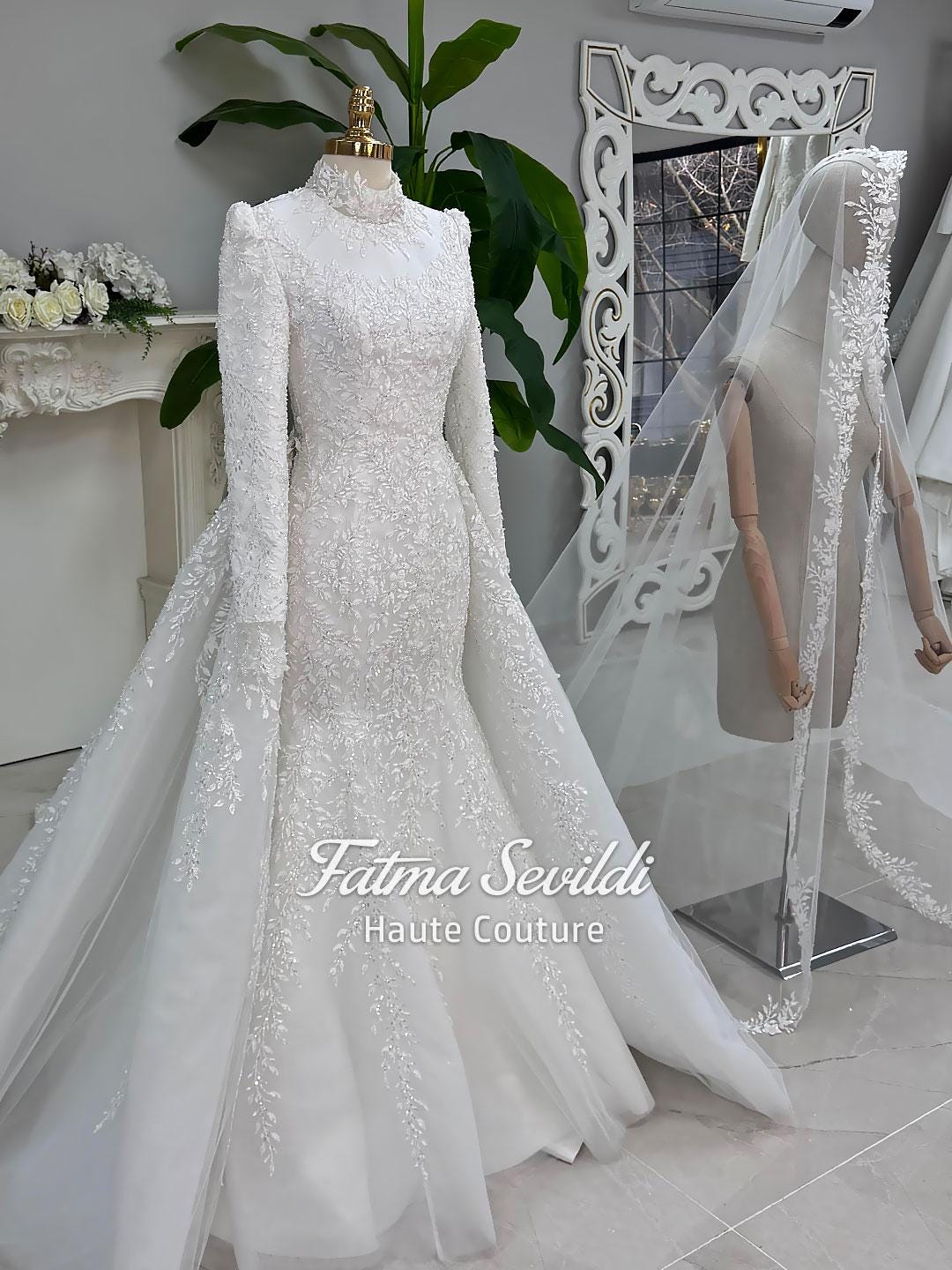 Elegant white mermaid hijab wedding dress with lace sleeves and detachable overskirt