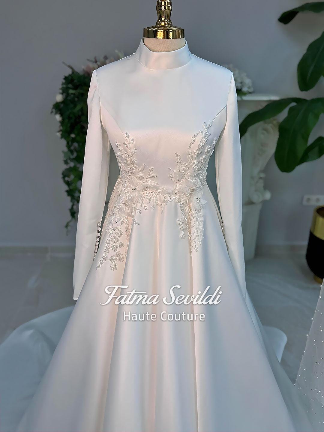 Elegant hijab wedding dress with high neck, long sleeves, satin A-line, beaded lace